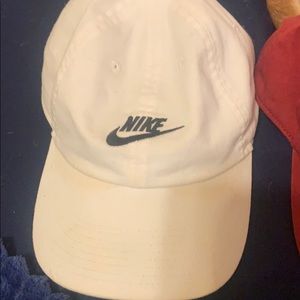 White nike hat red adidas hat